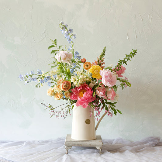 Sprawling Enamel Jug Arrrangement